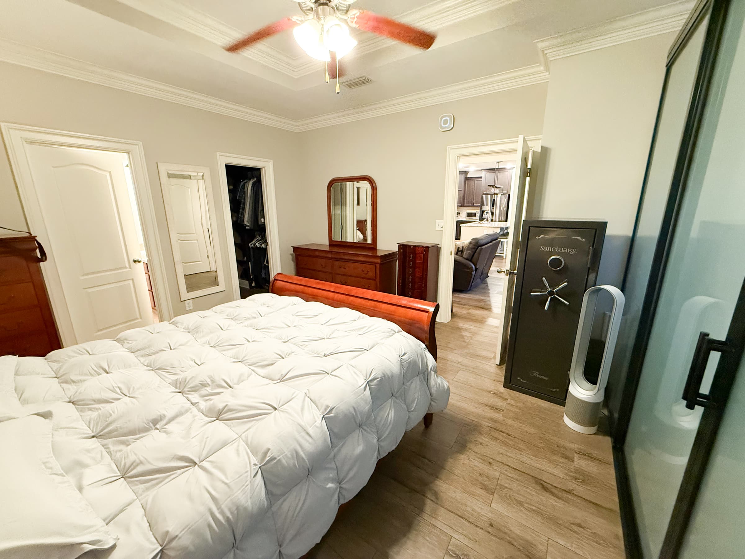 Primary bedroom with walk-in closet and en-suite bath access