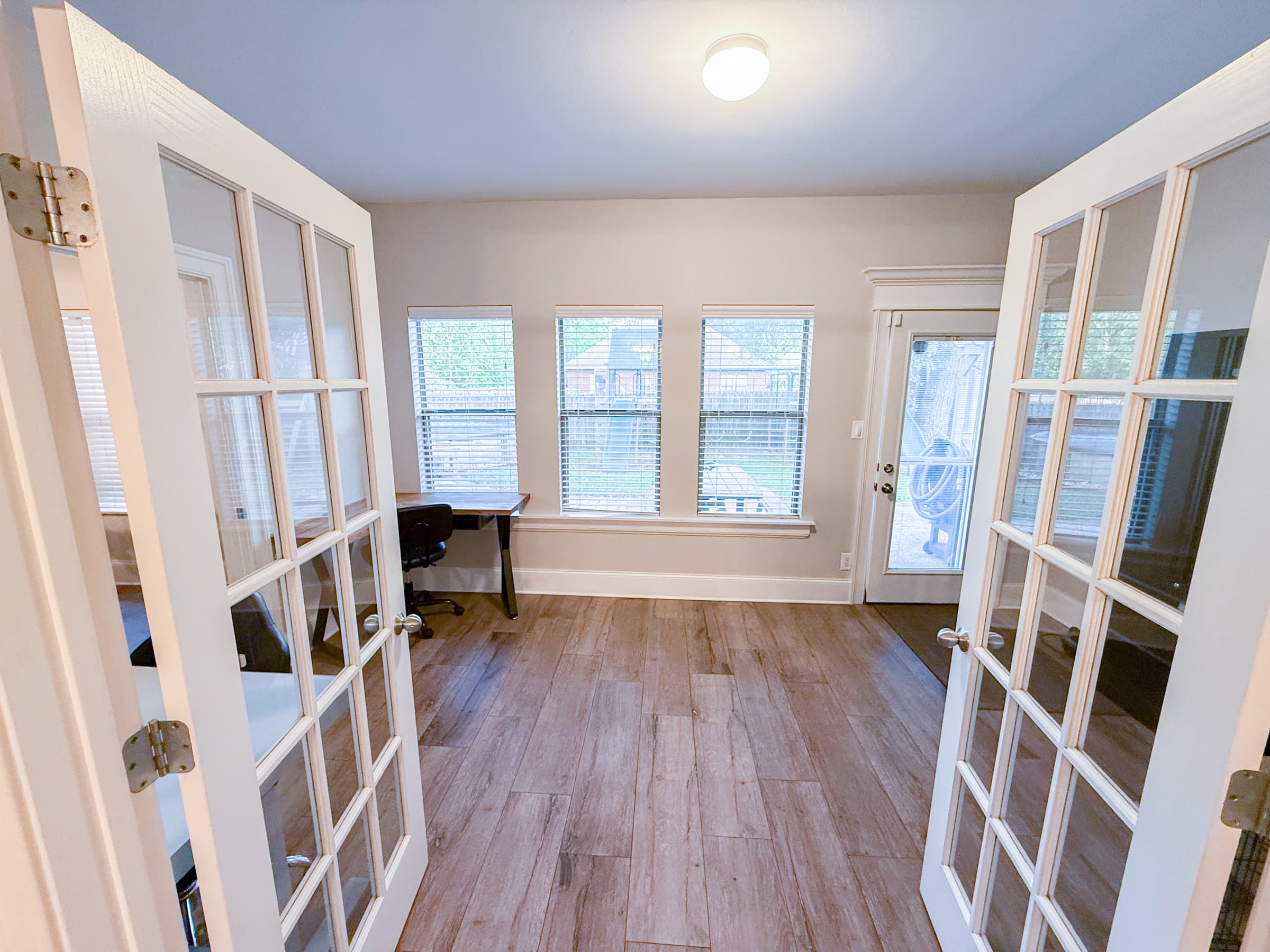 Sunroom with French doors and natural light