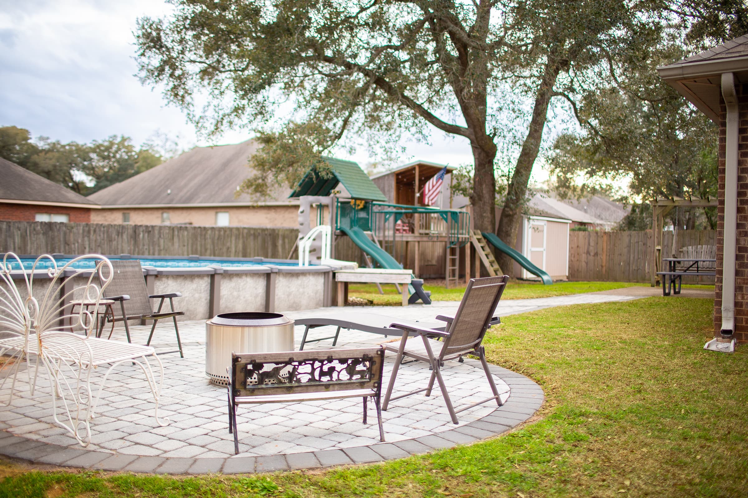Patio with fire pit and seating area